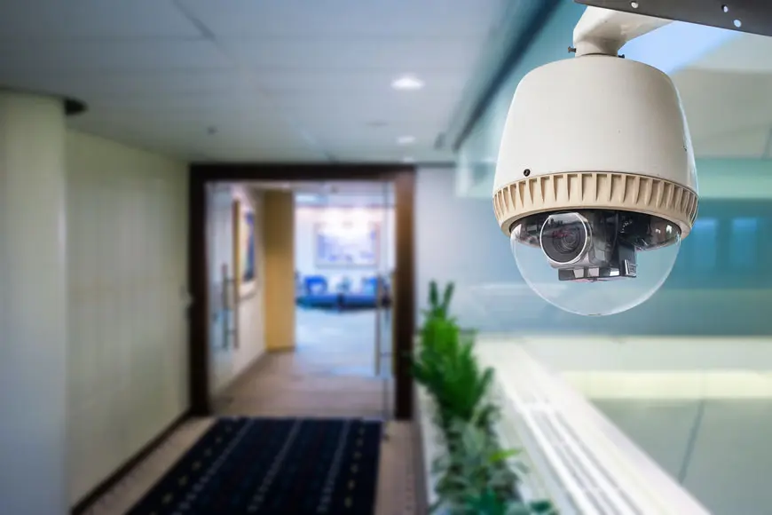 A Videoline dome camera installed in an office corridor
